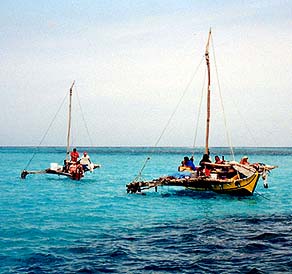Canoes off Tanapag