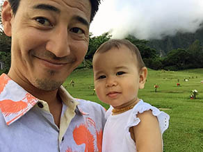 Kamaka and child at cemetery